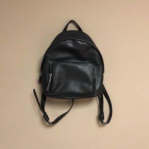 Mini black cruelty free leather backpack